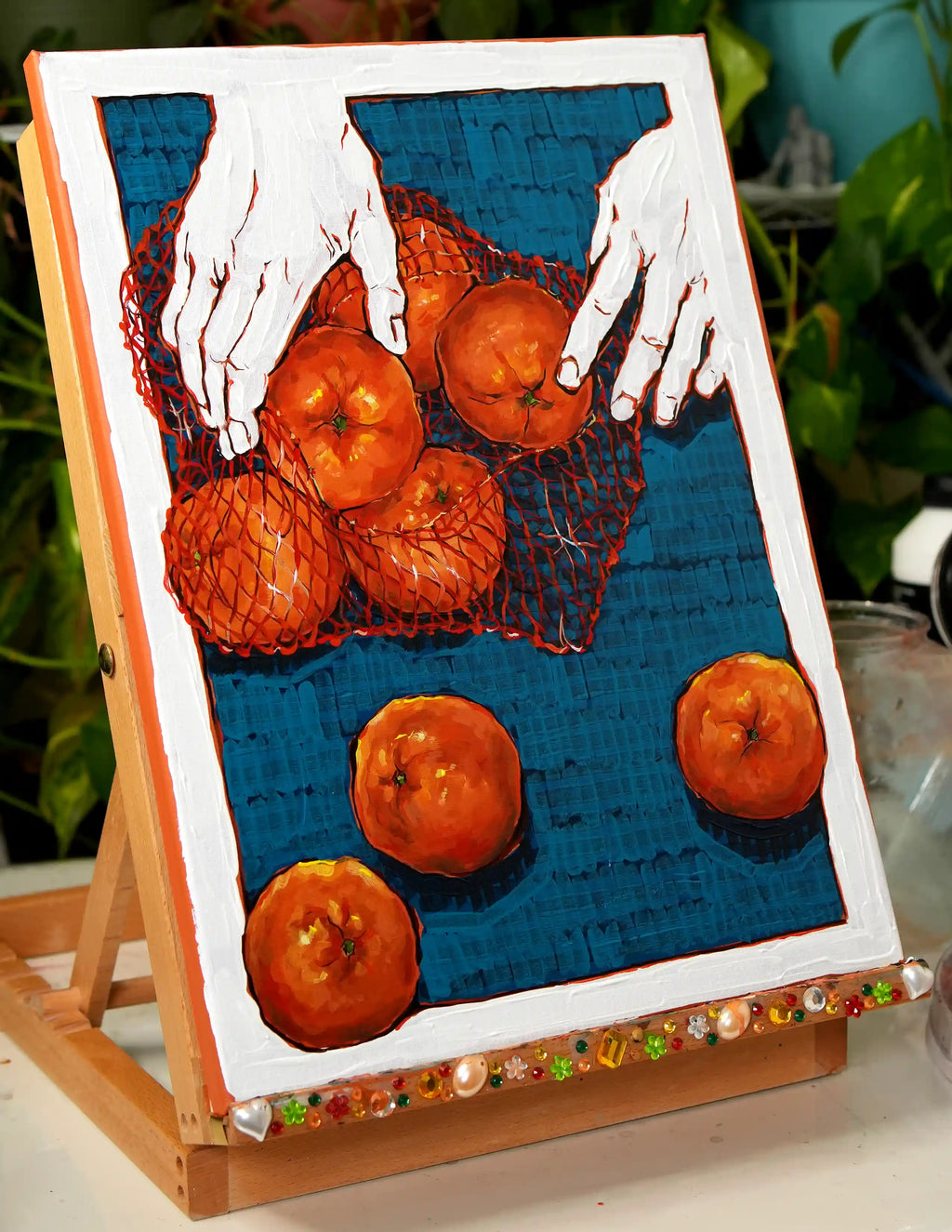 Tangerines in red net (original painting)